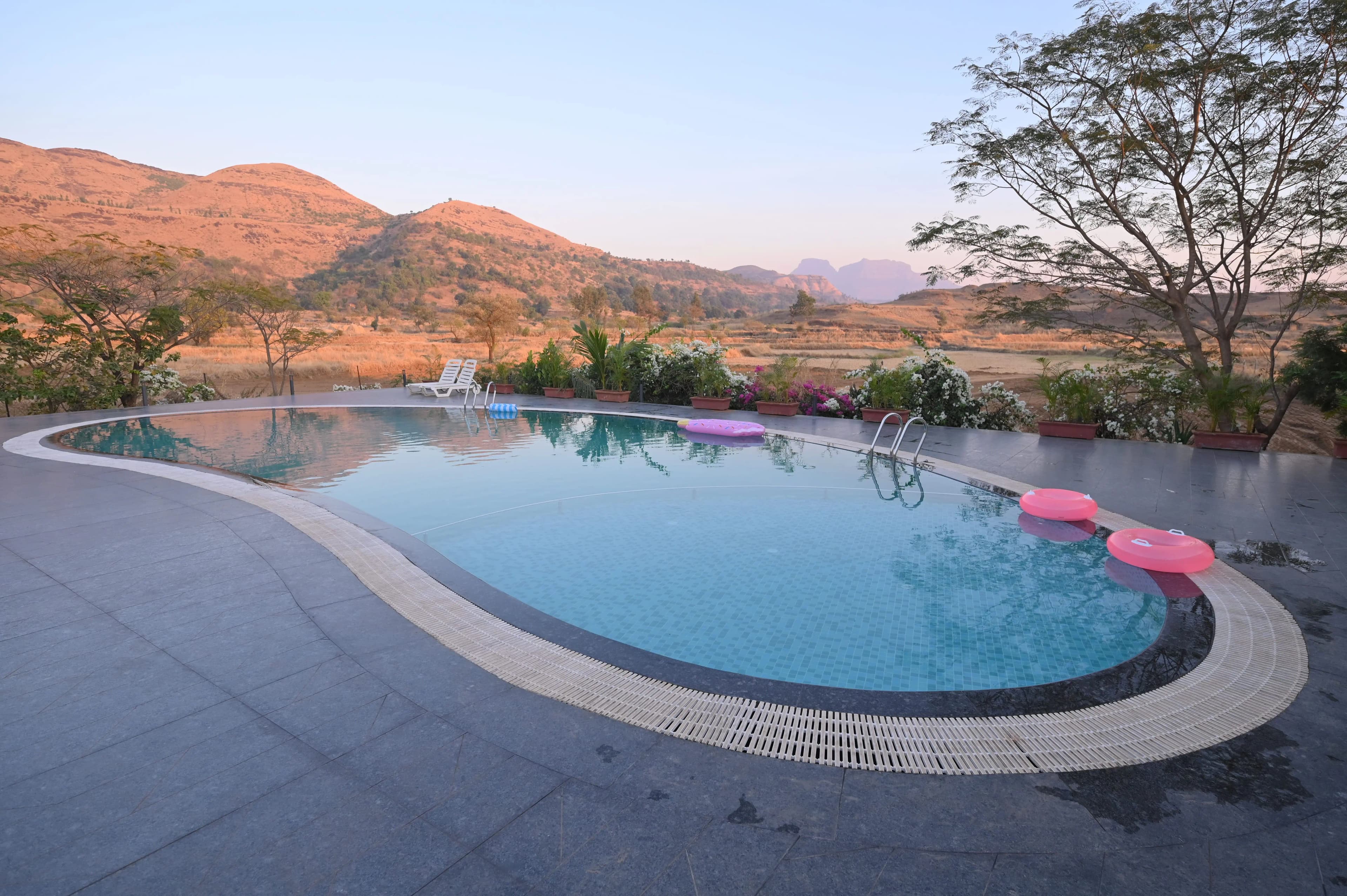 Resort in Igatpuri with swimming pool and mountain view