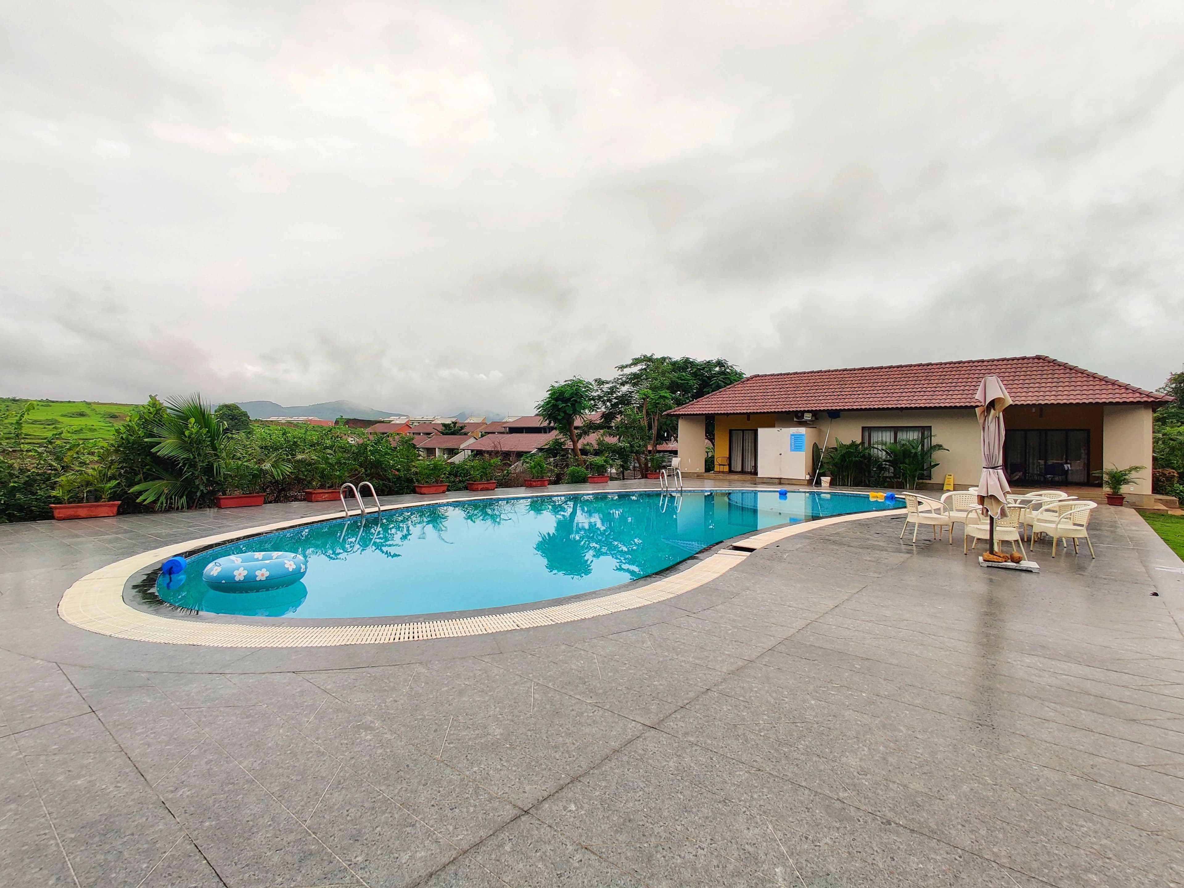 Swimming pool with mountain views at Touchwood Bliss, Igatpuri